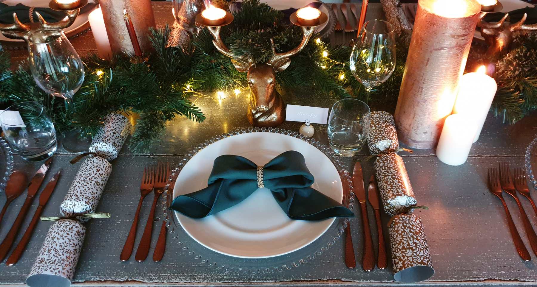 Festive place setting by a winter wedding hire supplier.