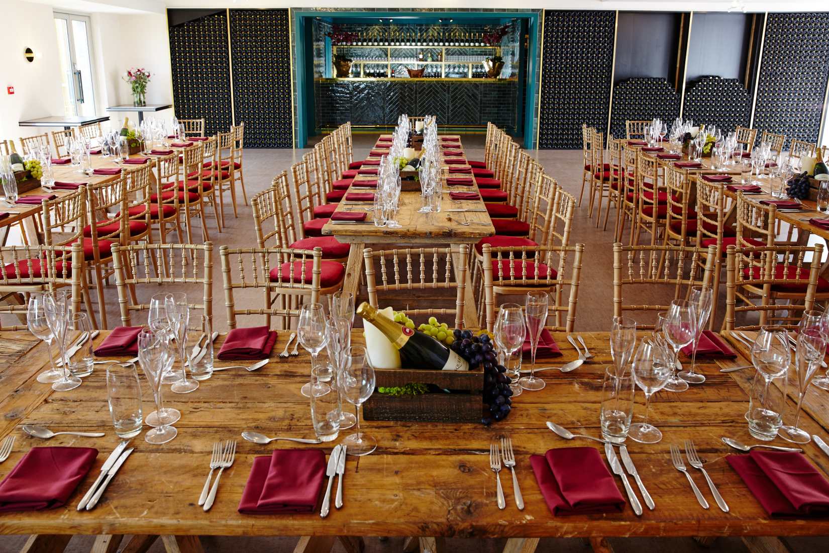 A group of people waving their arms at a corporate event
