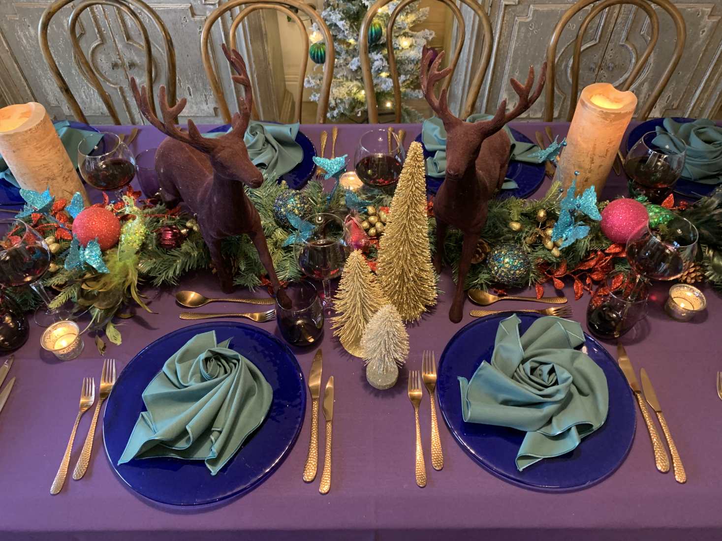 Bejewelled woodland table setting for Christmas parties.