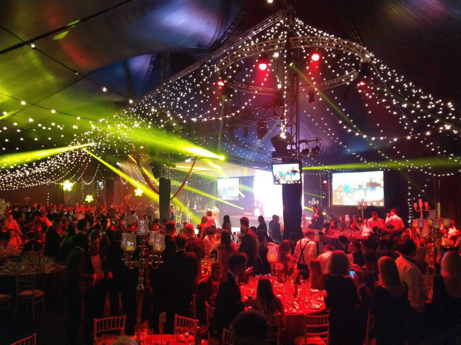 A glamorous company after Christmas party at a hotel, with a stunning light canaopy.