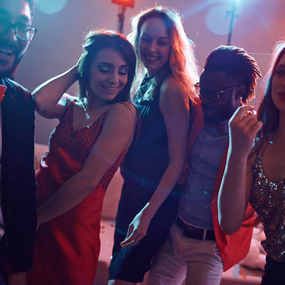 A group of young colleagues dancing.